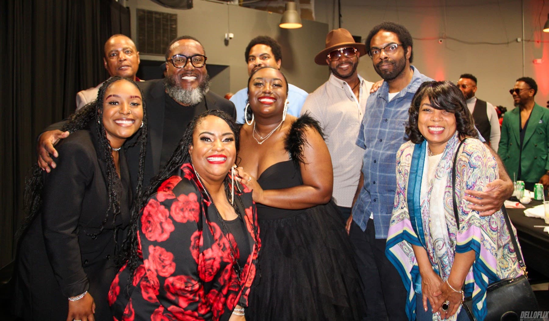 Group photo of performers and guests after a concert at La Familia Soundstage