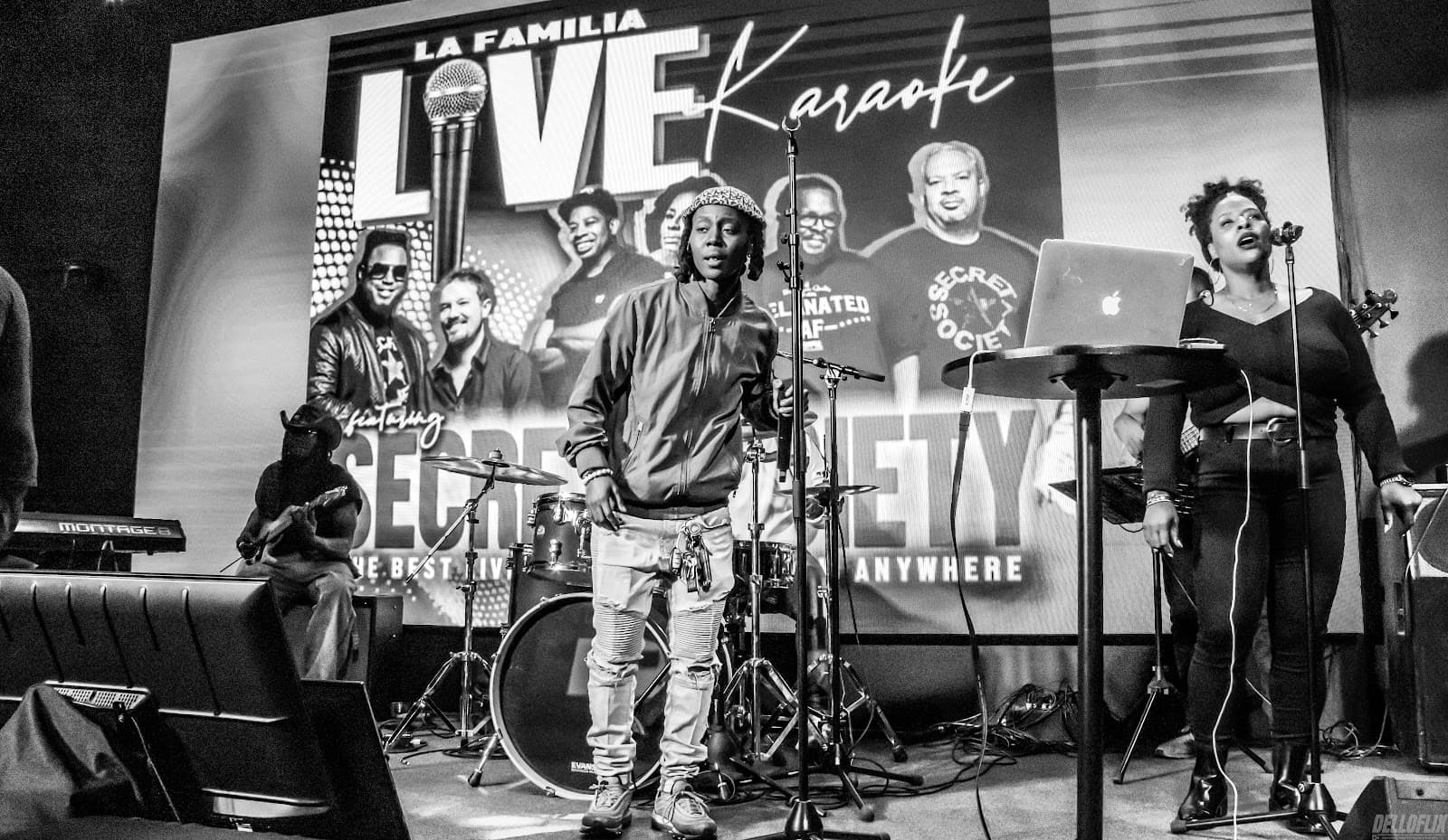 Wide shot of a live band on stage for karaoke night