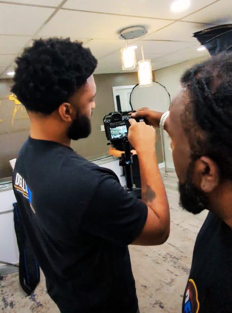 Camera operator filming a performance